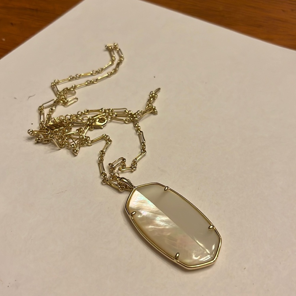 Gold Kendra Scott 30” necklace with pearl iridescent/white see through pendant.